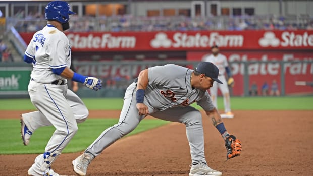 Jun 14, 2021; Kansas City, Missouri, USA; Detroit Tigers first baseman Miguel Cabrera (24) forces out Kansas City Royals first baseman Carlos Santana (41) at first base during the fifth inning at Kauffman Stadium. Mandatory Credit: Peter Aiken-USA TODAY Sports
